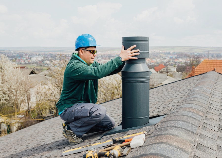 Chimney sweep at work near Foxborough, MA