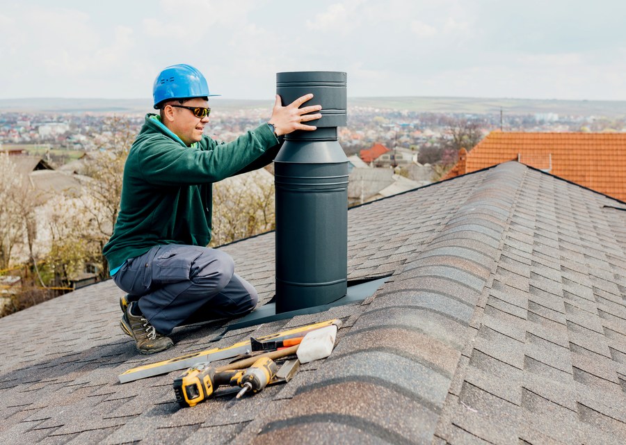Chimney sweep at work near Canton, MA