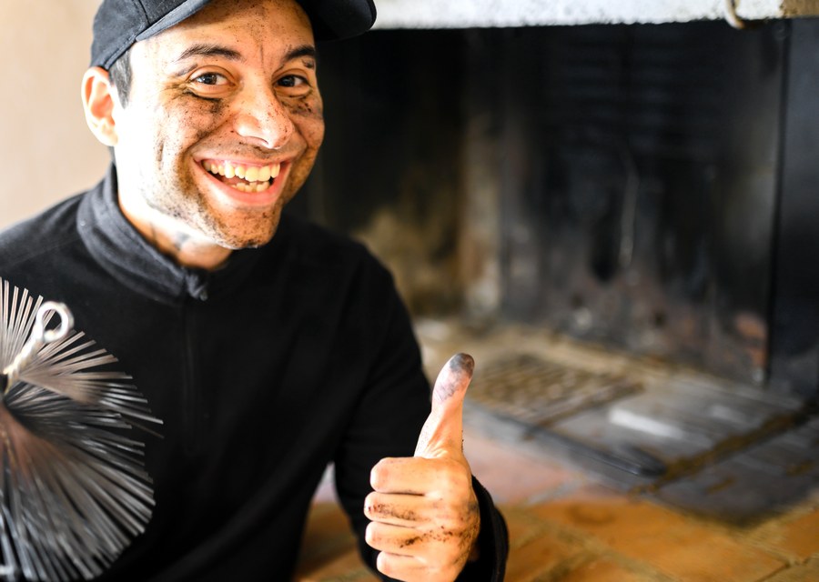 Chimney sweep at work near Springtown, TX