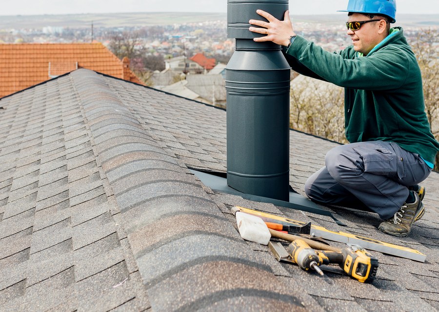 Chimney sweep at work near Bellaire, TX