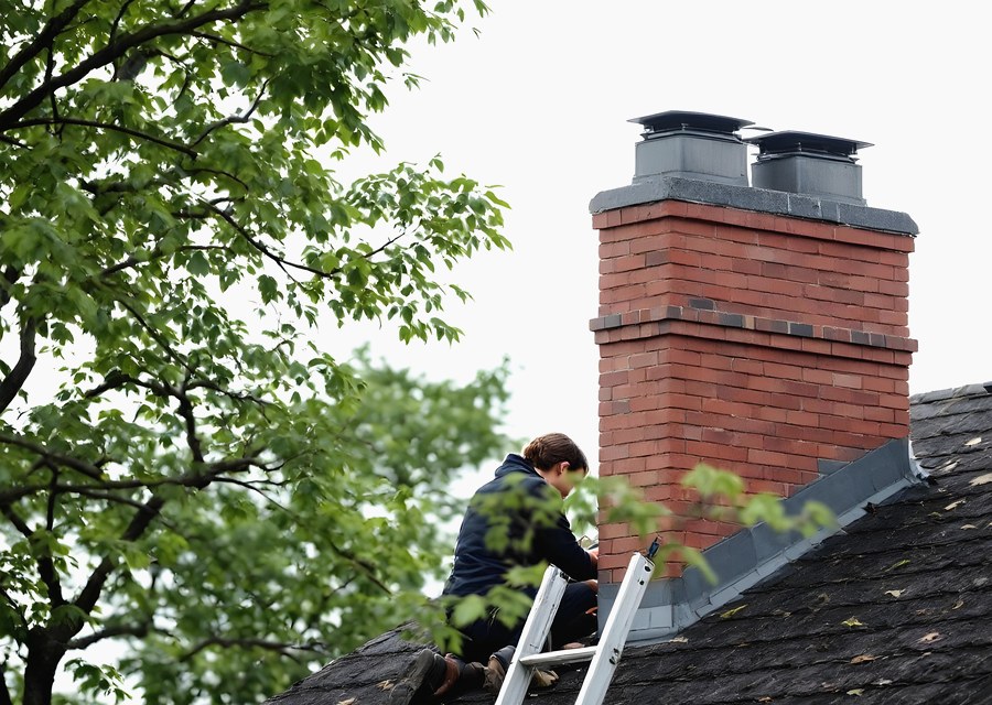 Chimney sweep at work near Balch Springs, TX