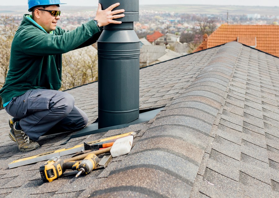 Chimney sweep at work near Millbury, MA