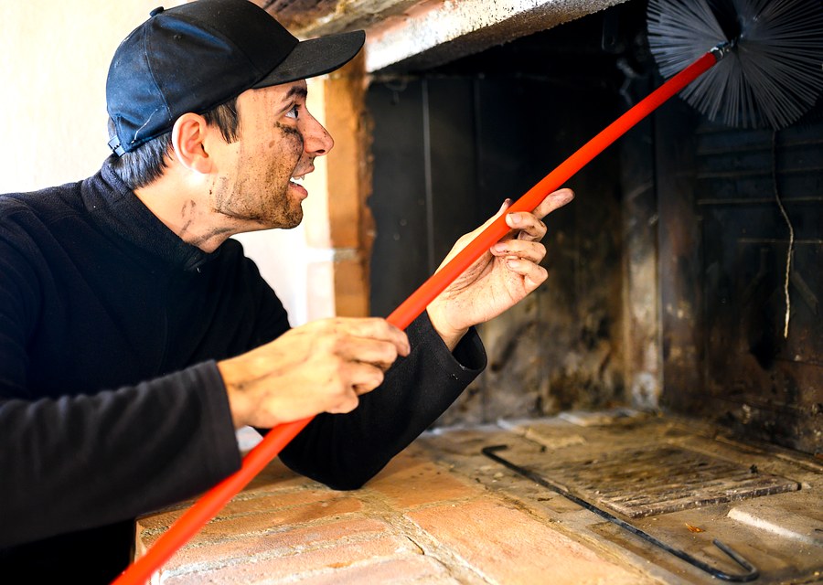 Chimney sweep at work near Leominster, MA