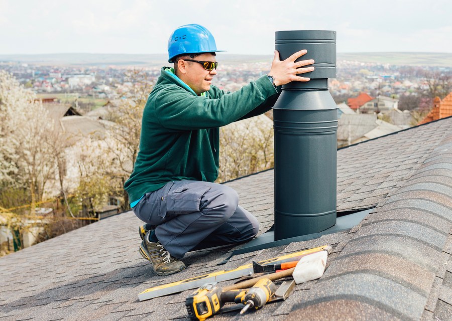 Chimney sweep at work near Fresno, TX