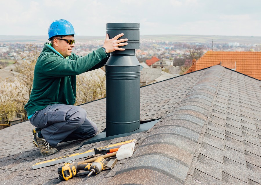 Chimney sweep at work near Ludlow, MA