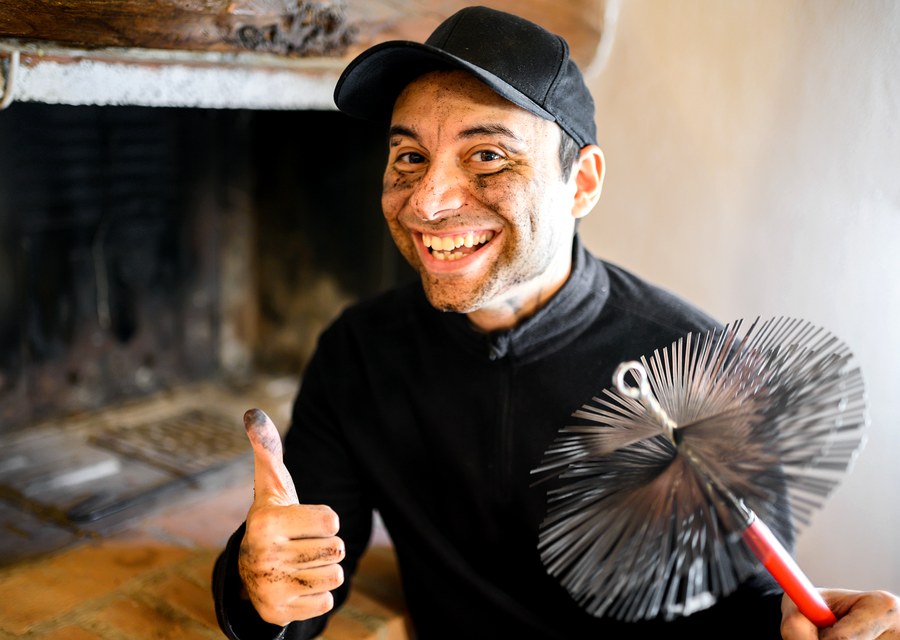 Chimney sweep at work near Cleburne, TX