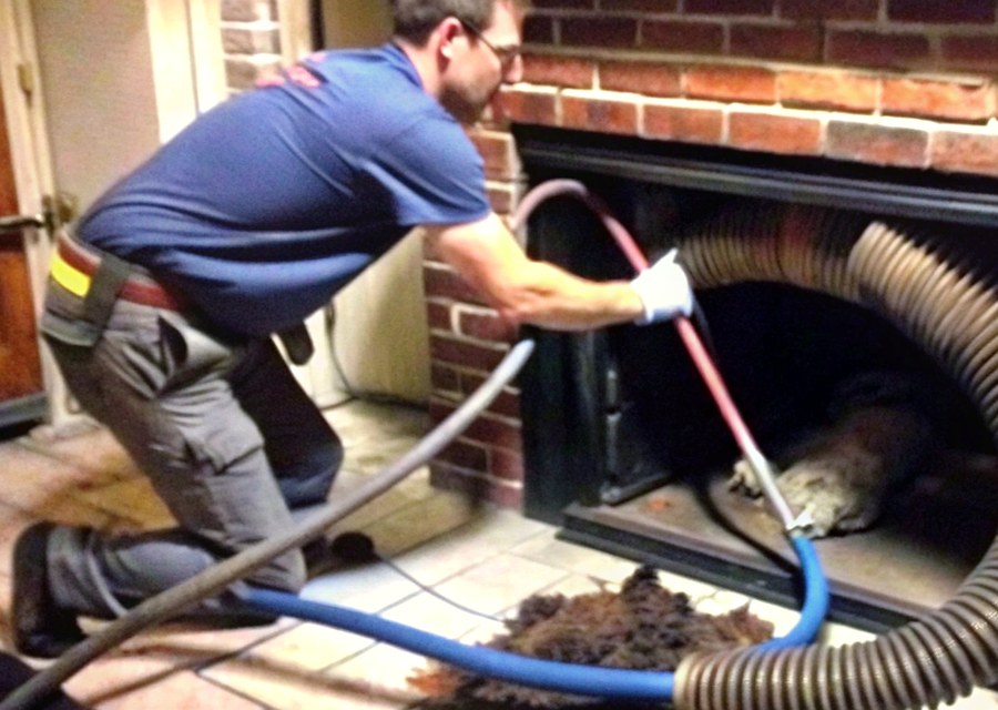 Chimney sweep at work near Willow Park, TX