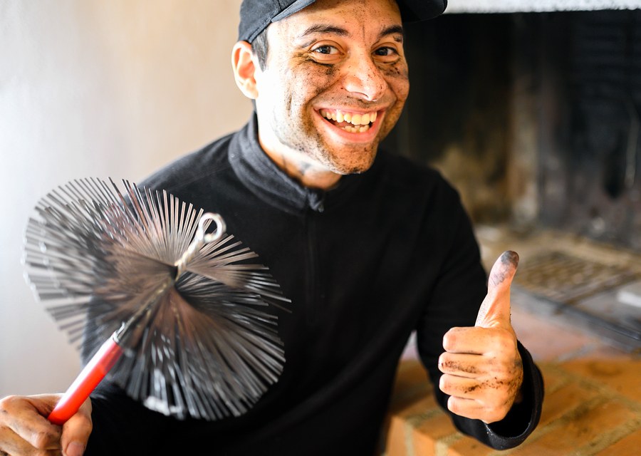 Chimney sweep at work near Castroville, TX