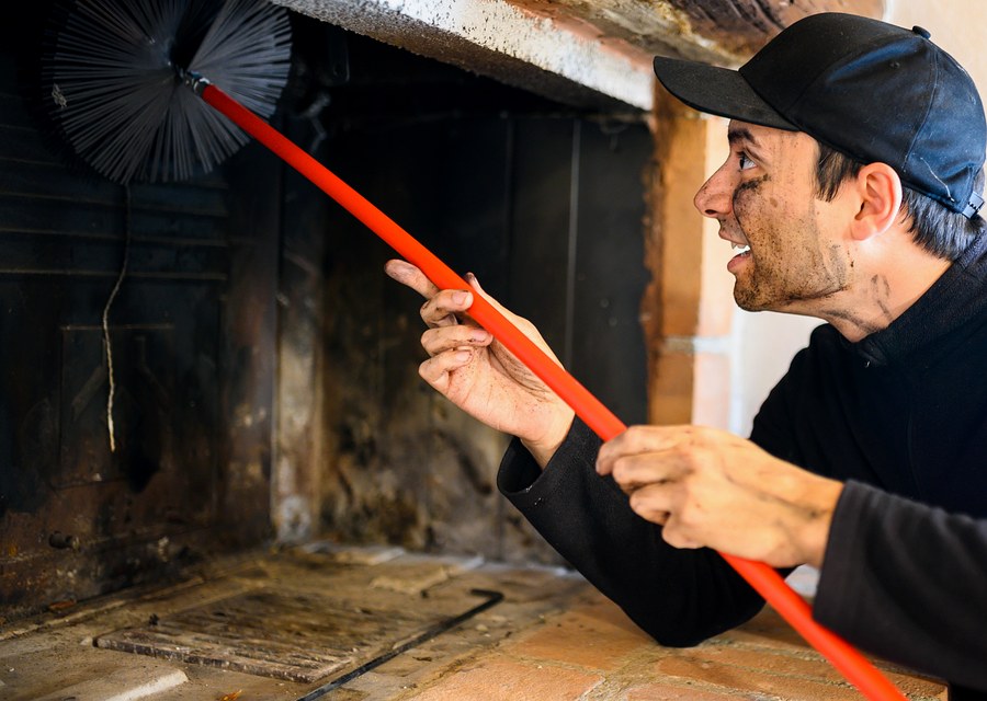 Chimney sweep at work near Framingham, MA
