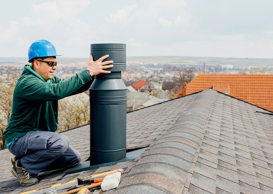 Chimney sweep at work near Winchester, MA