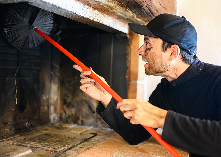 Chimney sweep at work near Garland, TX