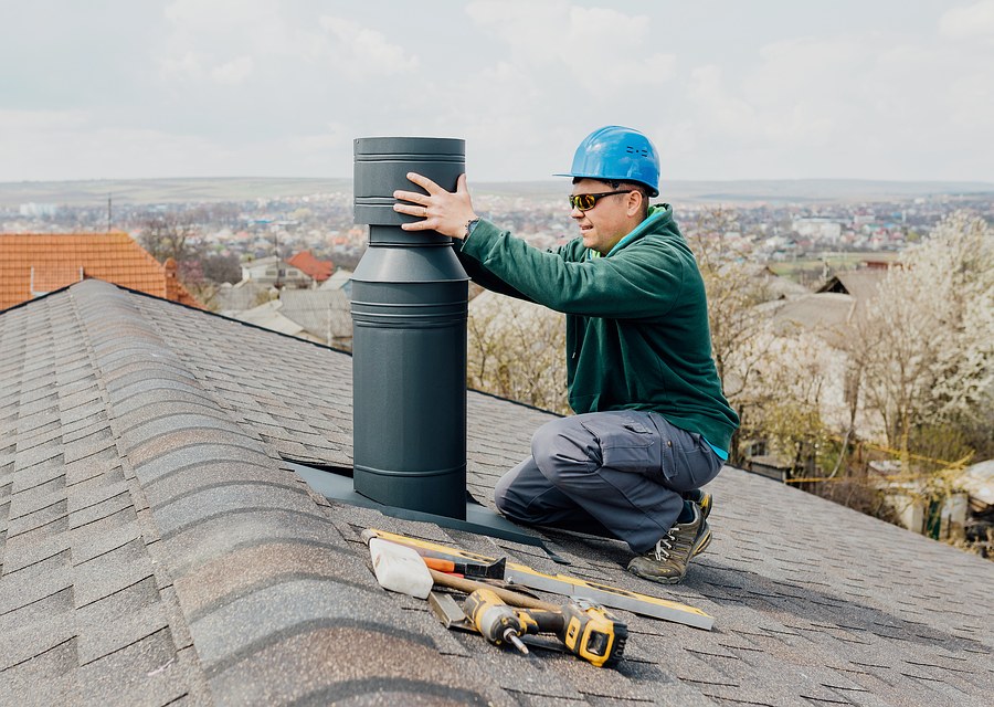 Chimney sweep at work near Liverpool, TX