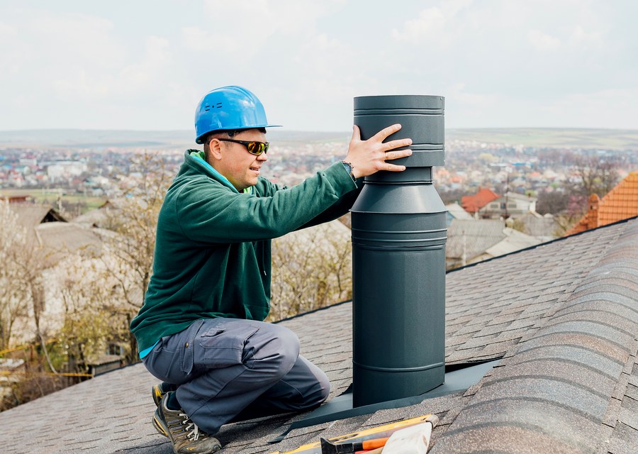Chimney sweep at work near Topsfield, MA