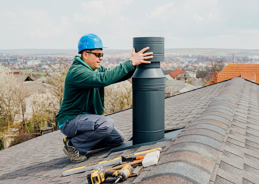 Chimney sweep at work near Medfield, MA