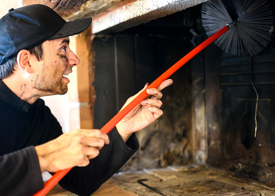 Chimney sweep at work near Schertz, TX