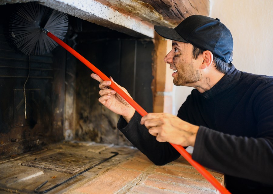 Chimney sweep at work near Arlington, TX