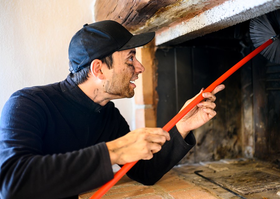Chimney sweep at work near Clute, TX
