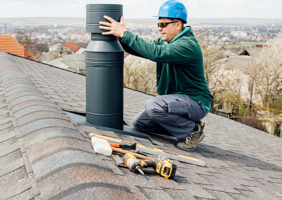 Chimney sweep at work near Bridgeport, TX