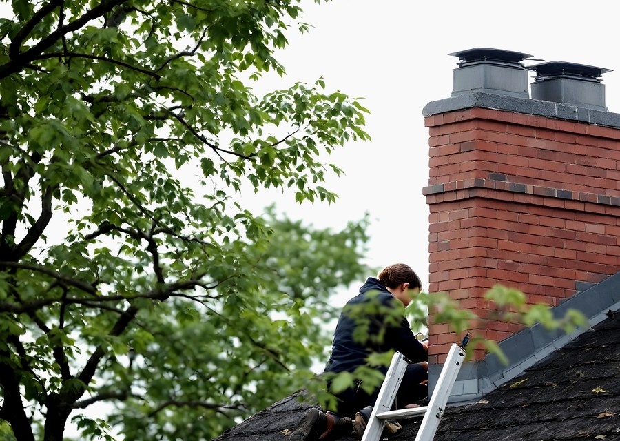 Chimney sweep at work near Lake Jackson, TX