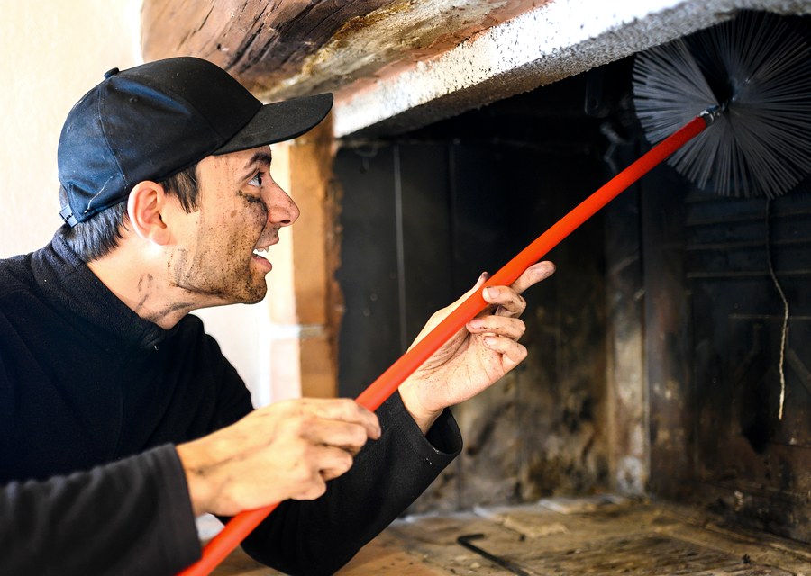 Chimney sweep at work near Granbury, TX