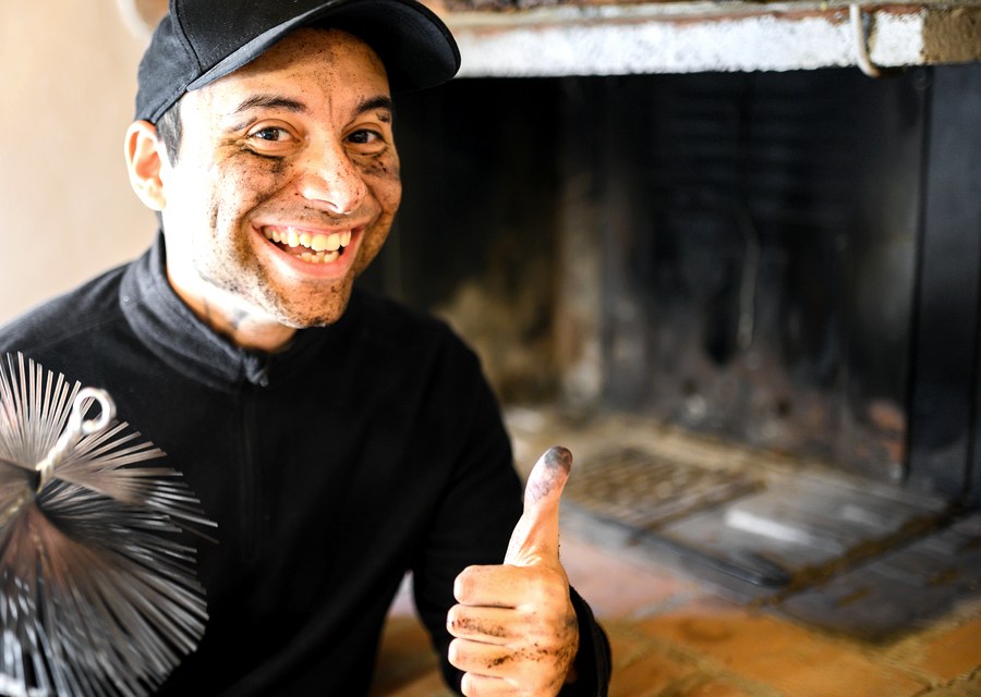 Chimney sweep at work near Sealy, TX