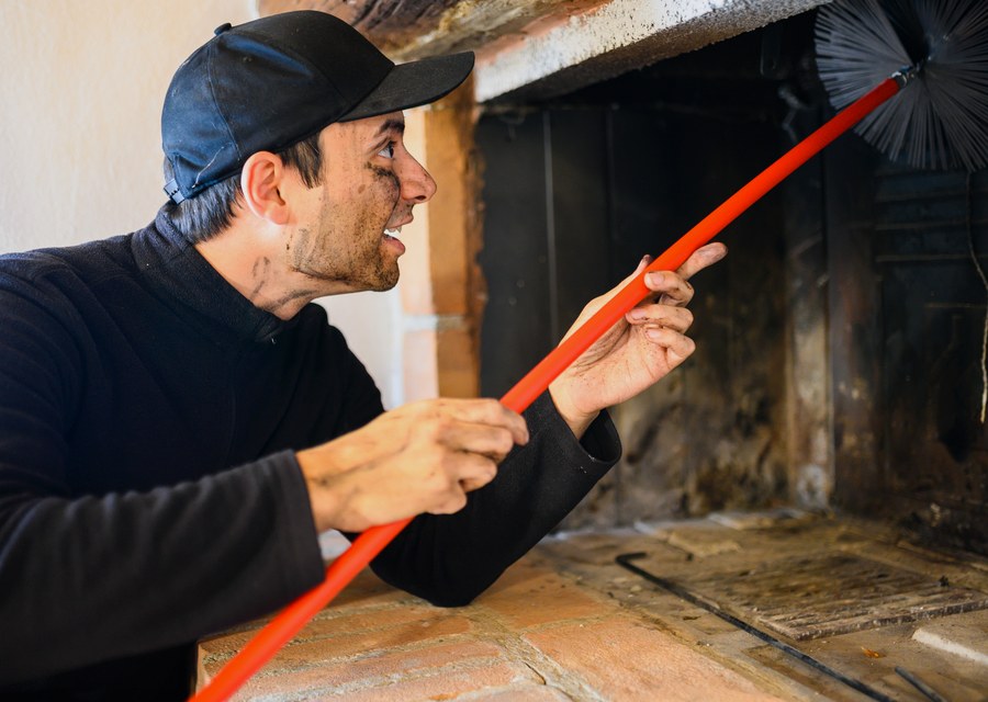 Chimney sweep at work near Carrollton, TX