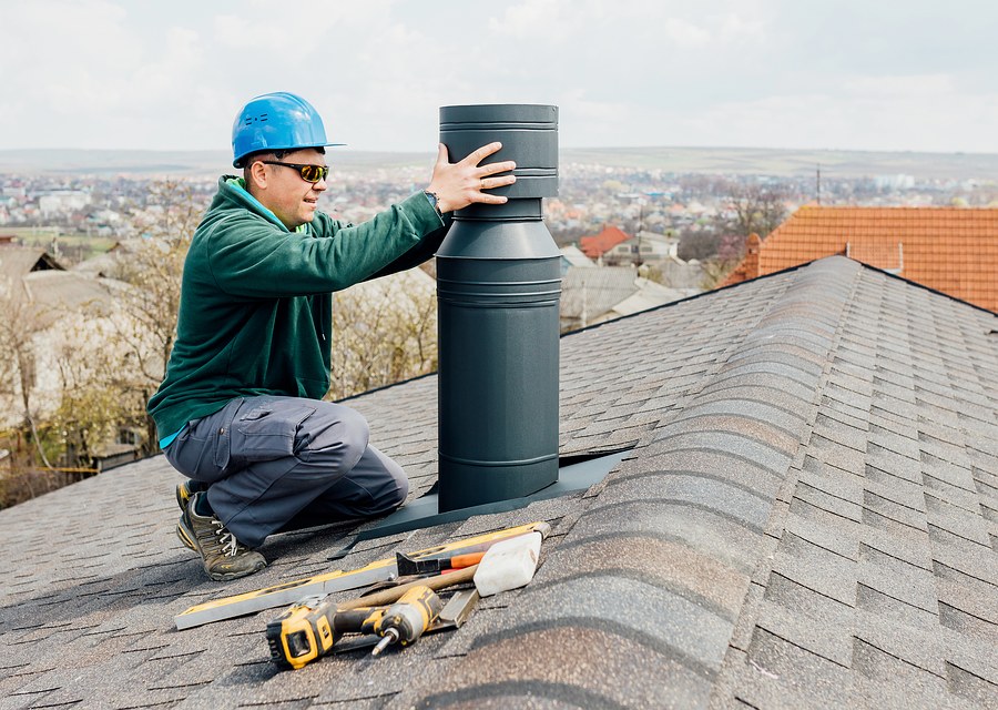 Chimney sweep at work near San Antonio, TX