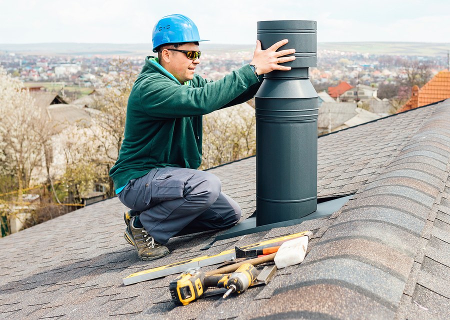 Chimney sweep at work near Waller, TX