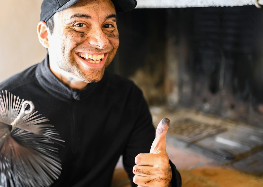Chimney sweep at work near Crowley, TX