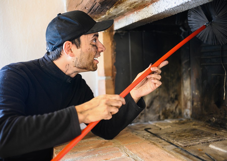 Chimney sweep at work near Ipswich, MA