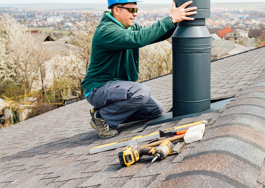 Chimney sweep at work near Fitchburg, MA