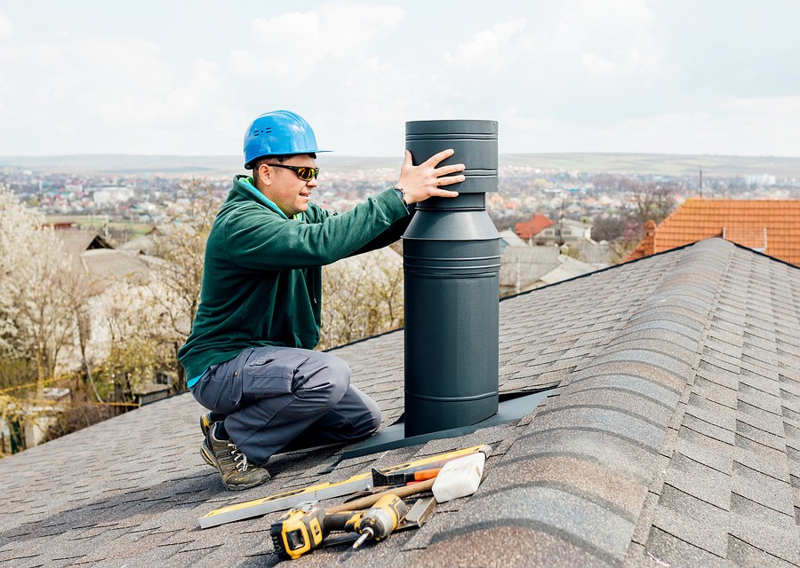 Chimney sweep at work near Westborough, MA