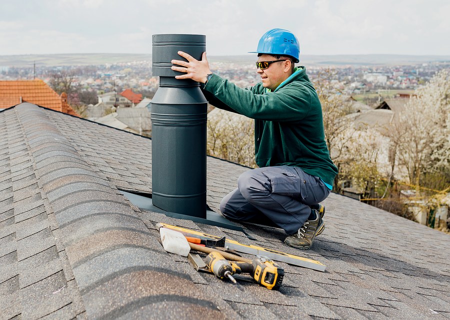 Chimney sweep at work near Pepperell, MA