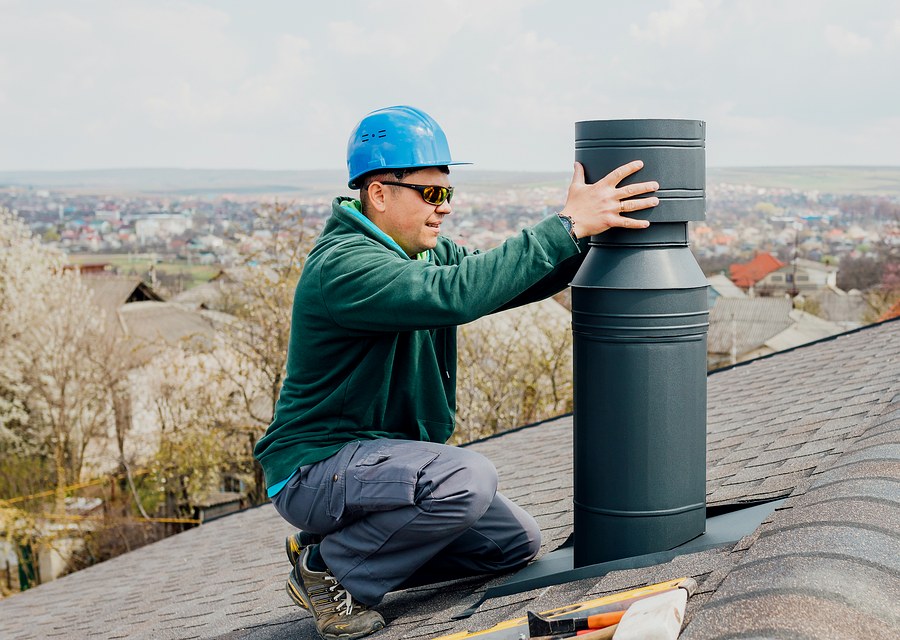 Chimney sweep at work near Lancaster, TX