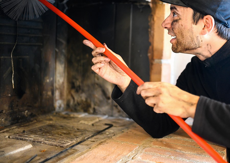 Chimney sweep at work near Marshfield, MA