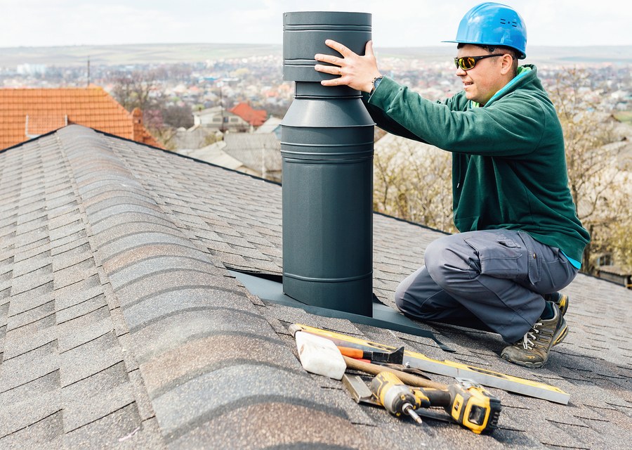 Chimney sweep at work near Pittsfield, MA