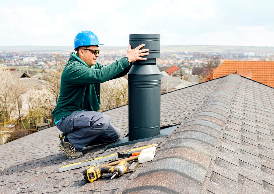 Chimney sweep at work near Bernardston, MA