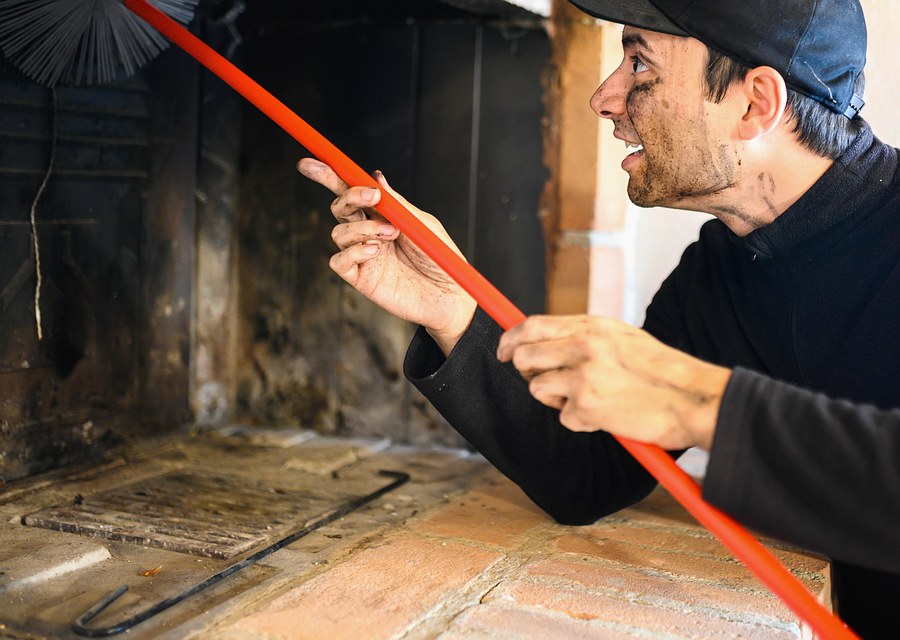 Chimney sweep at work near Winchendon, MA