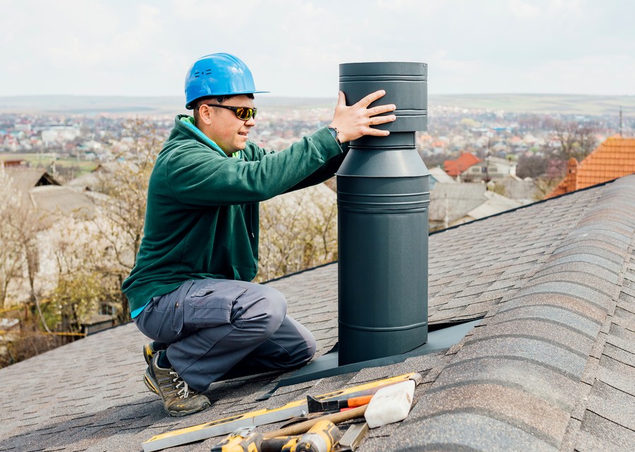 Chimney sweep at work near Maynard, MA