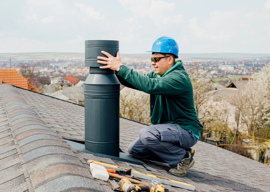 Chimney sweep at work near Lenox, MA