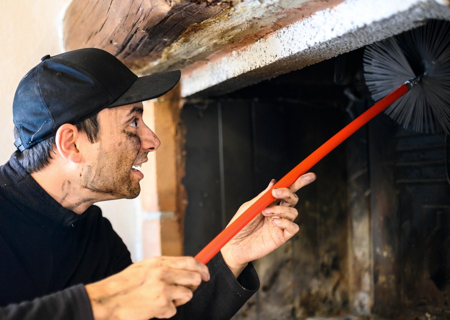 Chimney sweep at work near North Adams, MA