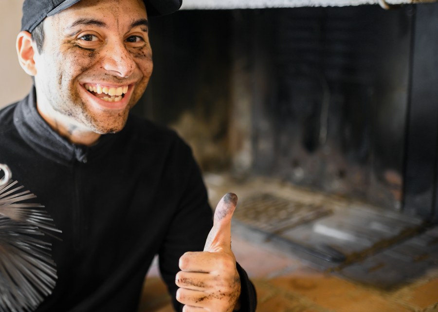 Chimney sweep at work near Salem, MA
