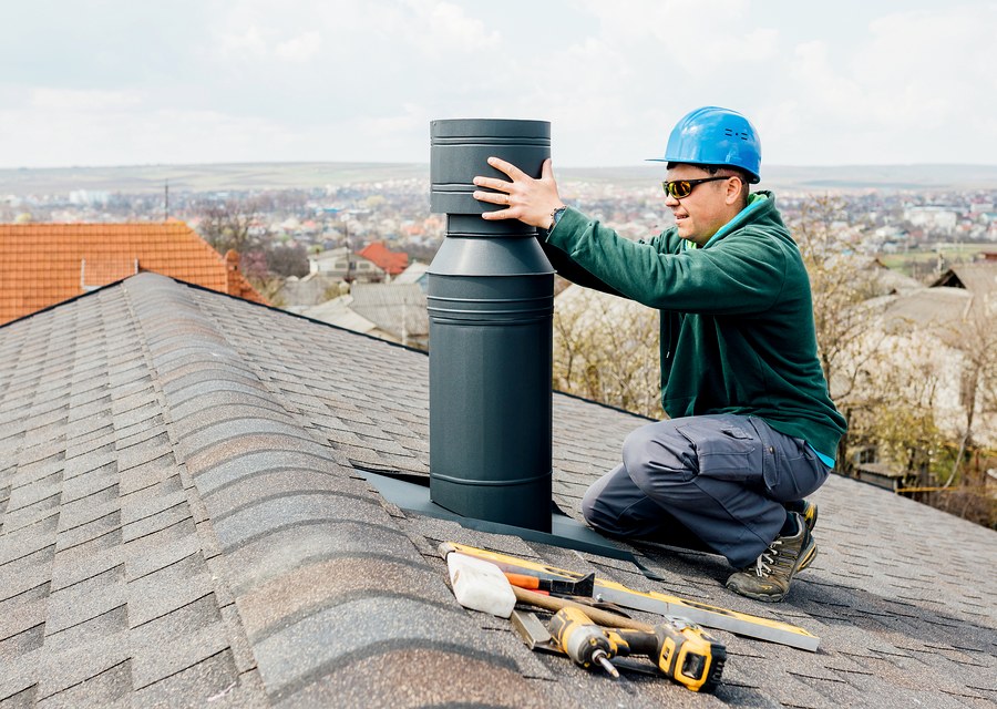 Chimney sweep at work near Manchester by the Sea, MA