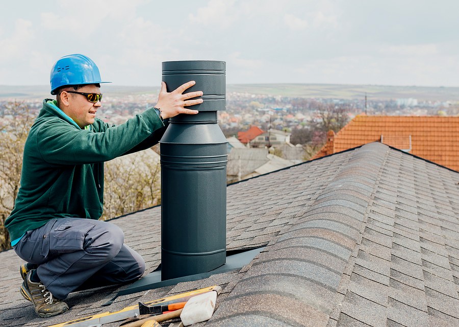 Chimney sweep at work near Rowley, MA