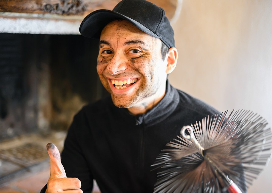 Chimney sweep at work near Sunnyvale, TX