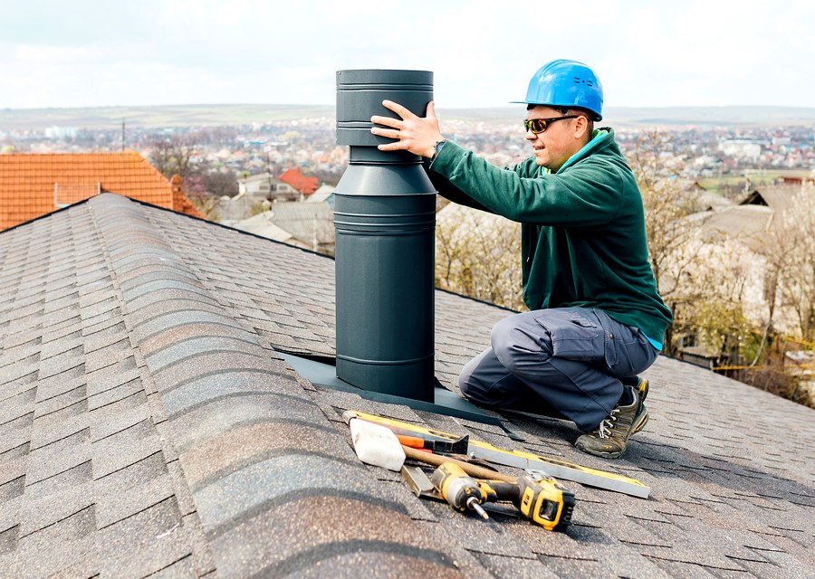 Chimney sweep at work near Arcola, TX