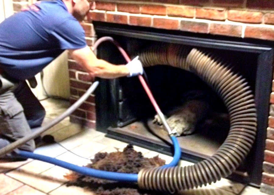 Chimney sweep at work near Ashland, MA