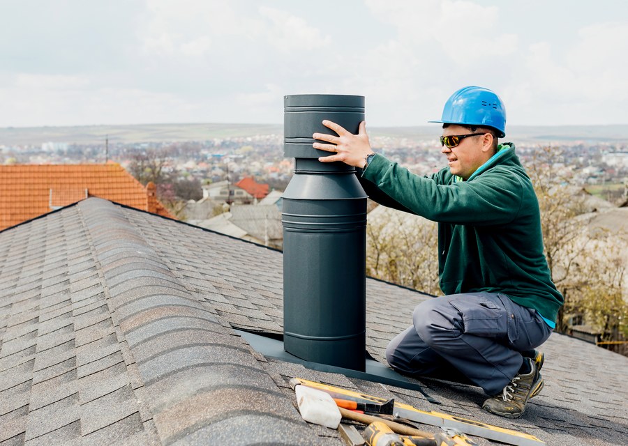 Chimney sweep at work near Wimberley, TX