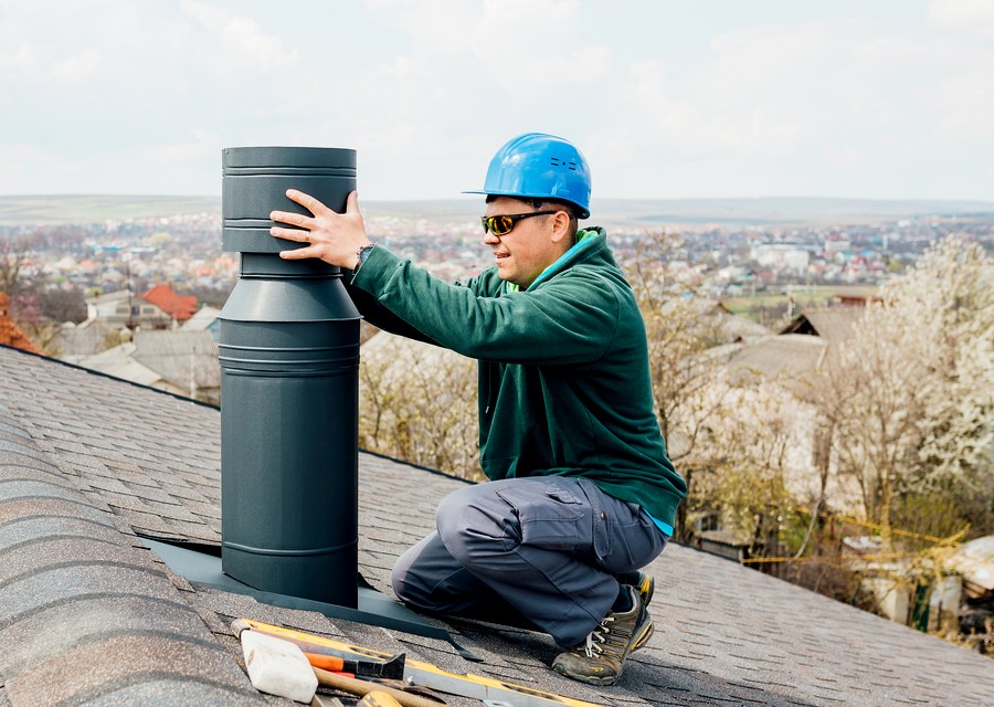 Chimney sweep at work near Fairview, TX
