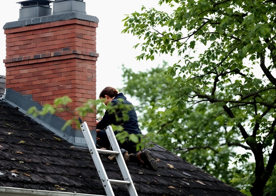 Rooftop chimney repair in Pipe Creek, TX
